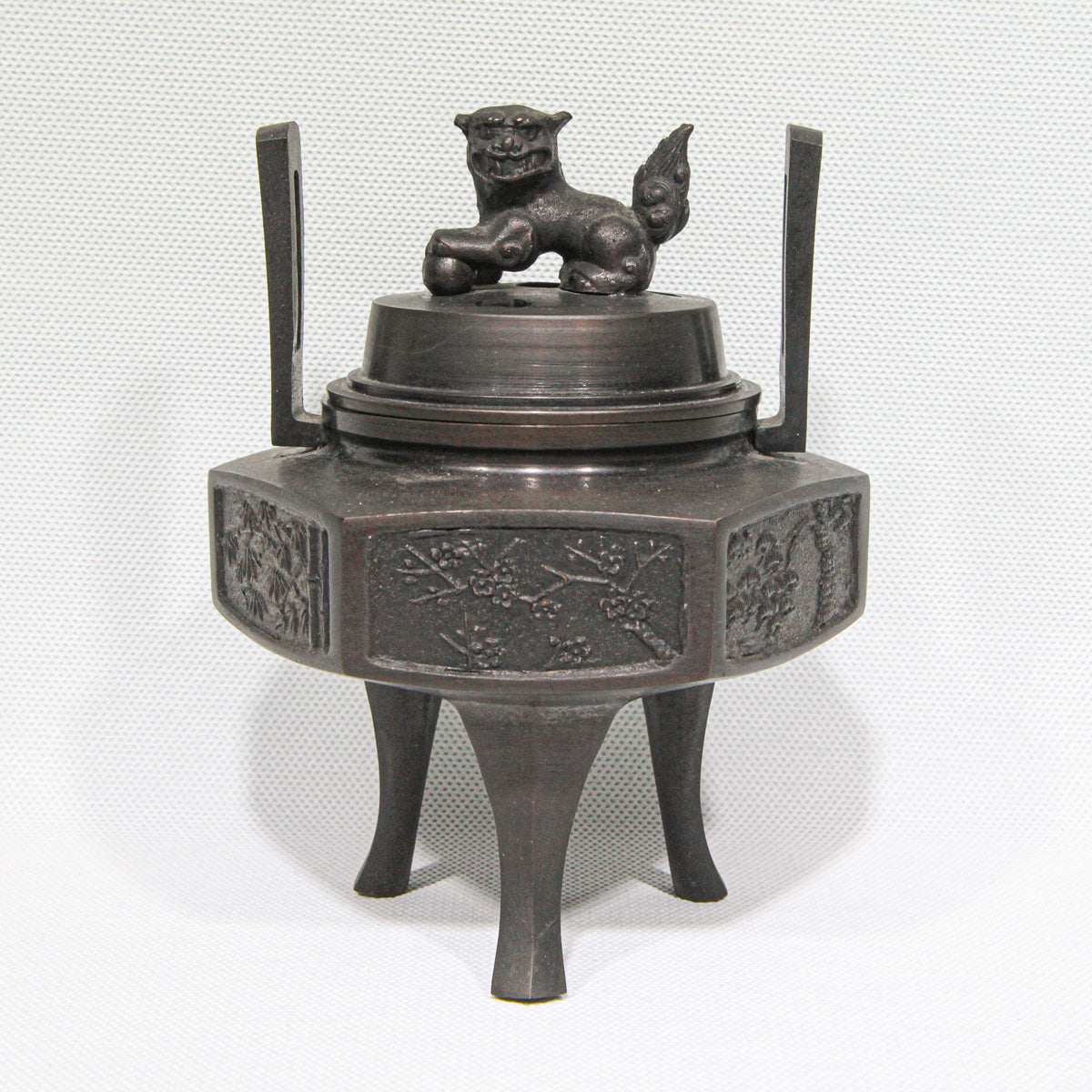 Hexagonal Bronze Kōro with Lion Finial