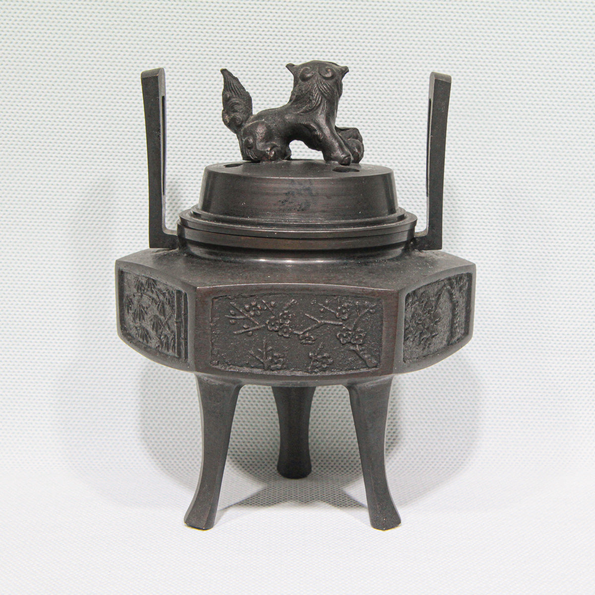 Hexagonal Bronze Kōro with Lion Finial