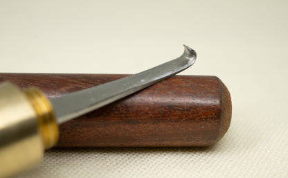 Left hander Shaving knife with wooden holder.